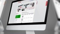 Monitor mit geöffneter Website eines Onlineshops für Werkzeuge.