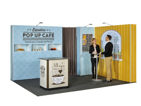Expolinc Pop Up System als Café-Messestand mit Tresen, Rückwand und dekorativen Grafikpaneelen – flexibles Messedesign für Veranstaltungen
