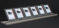 LED-Schaufenster-Display mit mehreren beleuchteten Acrylrahmen, präsentiert Exposés auf einer Fensterbank als modernes Standsystem