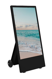 Schwarzes digitales Informationsdisplay mit Rädern, zeigt ein Strand- und Meerbild